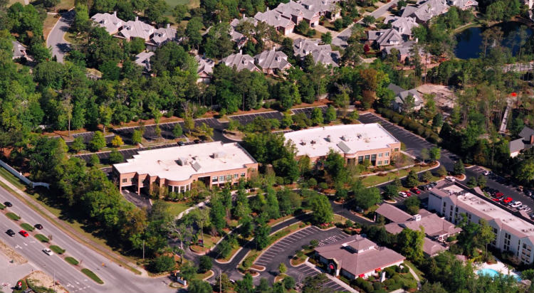 Wilmington law firm Murchison, Taylor & Gibson is relocating its main operations to Landfall Park, in the building called Landfall Park South (left). (Photo courtesy of Cape Fear Commercial)