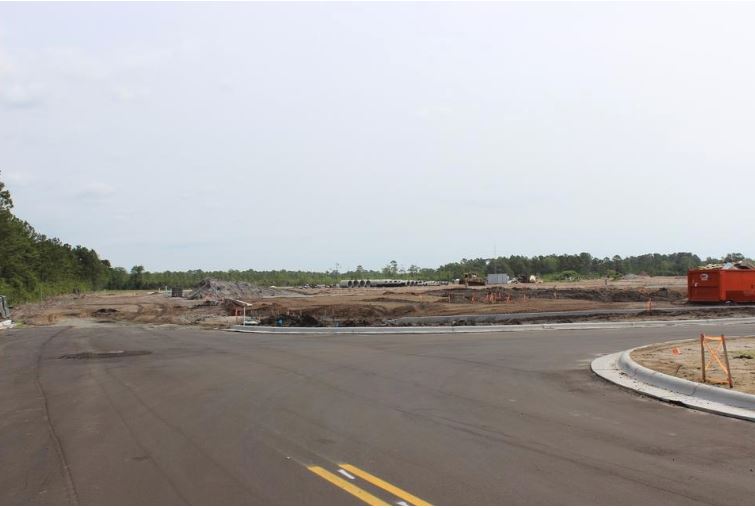 Roads and infrastructure are in place for the new Southport Crossings shopping center at the corner of N.C. 133 and N.C. 211. The center recently accepted its first tenant, a CVS Pharmacy.