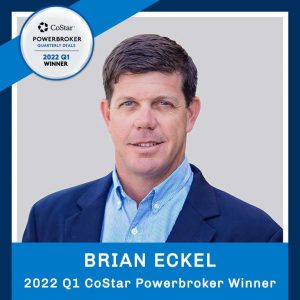 Brian Eckel Headshot With 2022 Q1 CoStar Powerbroker Badge