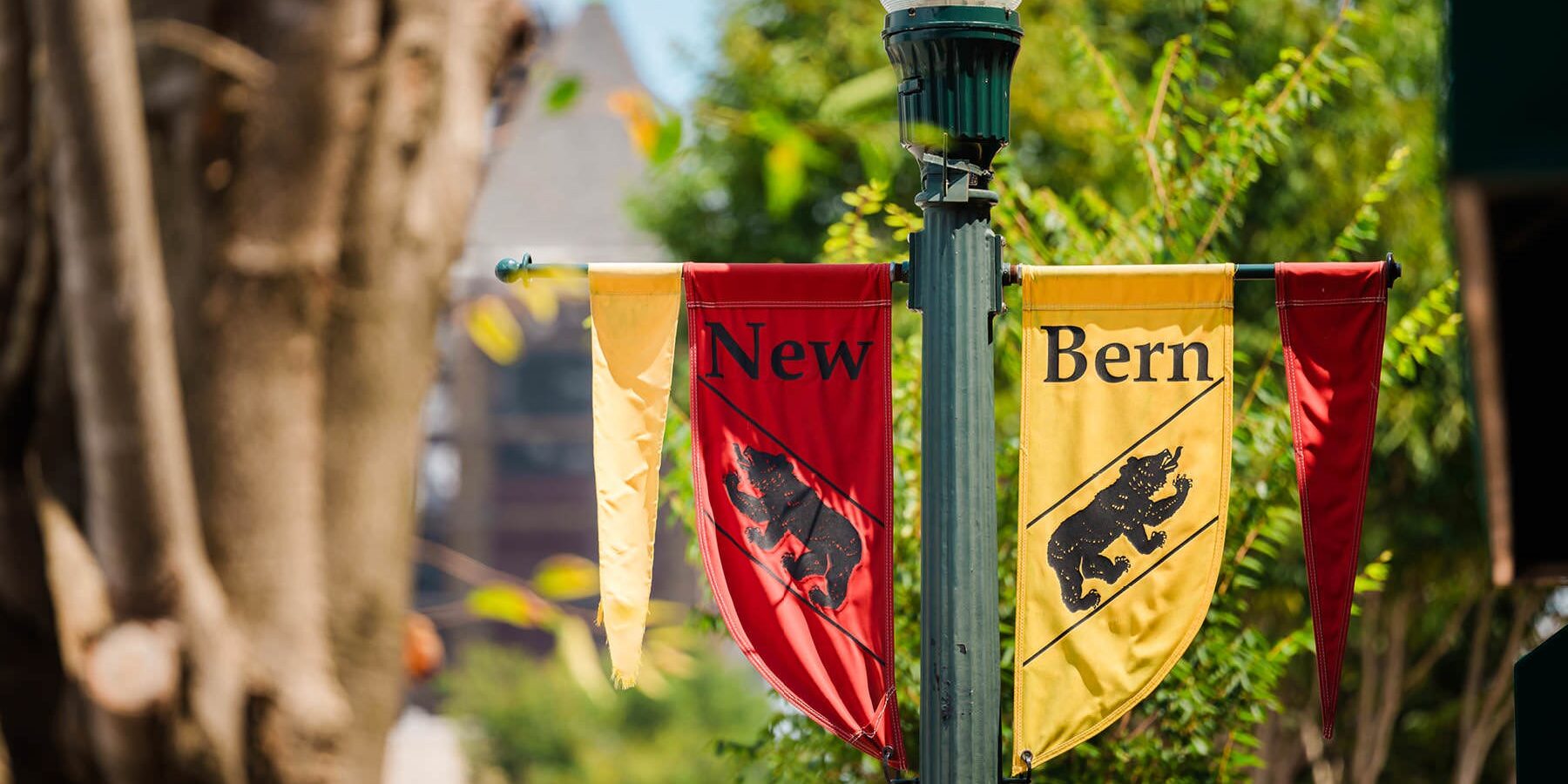 New Bern flags on light pole