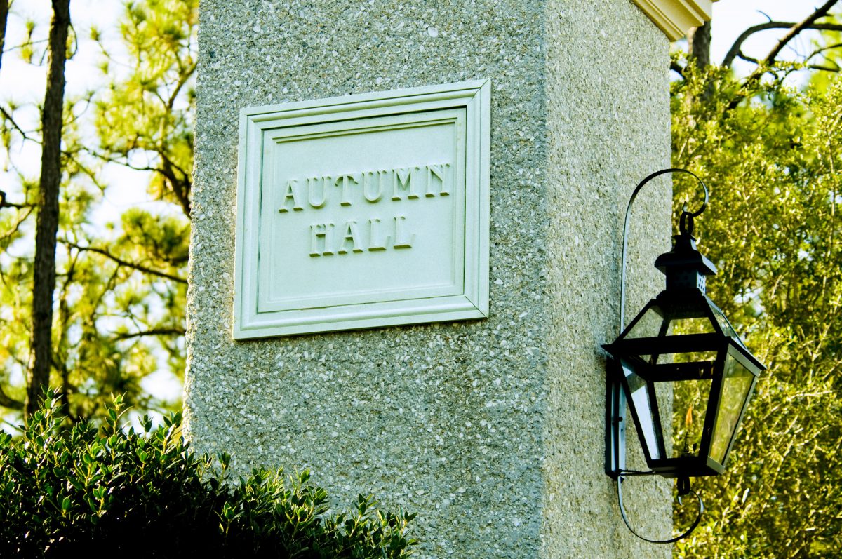 Autumn Hall sign on concrete post
