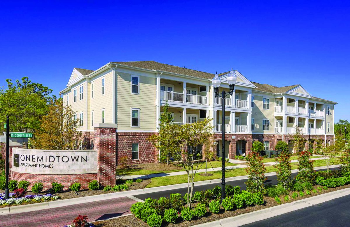 One Midtown exterior: sign + apartment complex