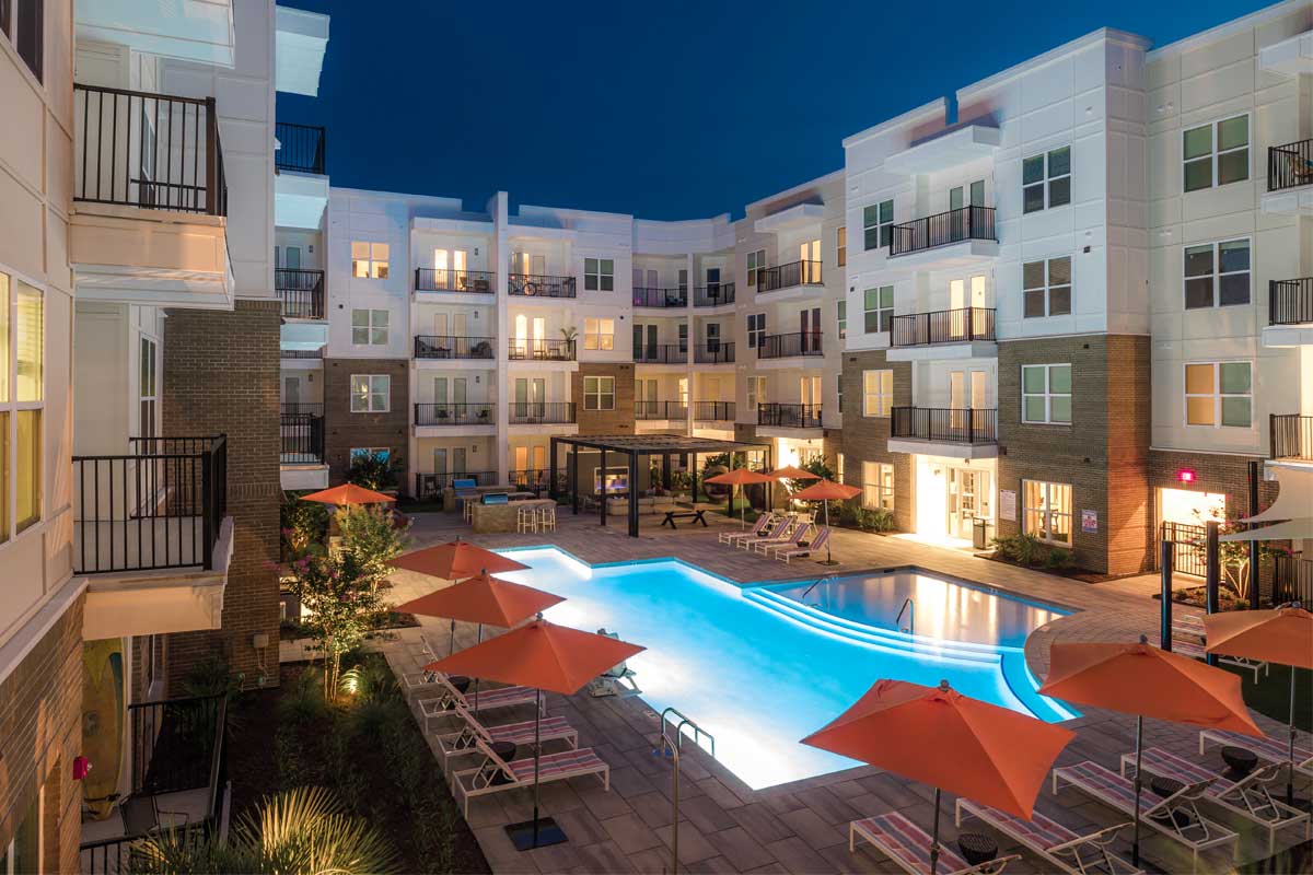 Hudson Renaissance exterior: pool + apartments