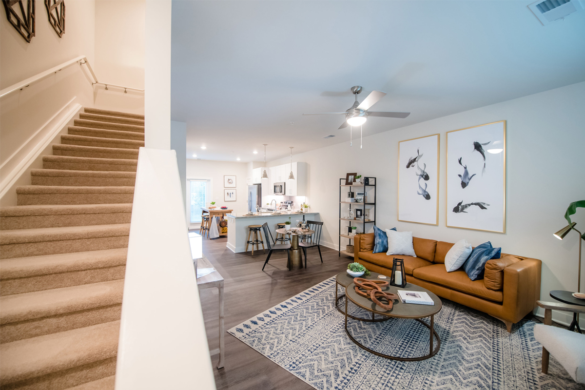 Woodlands Landing interior: living room + kitchen