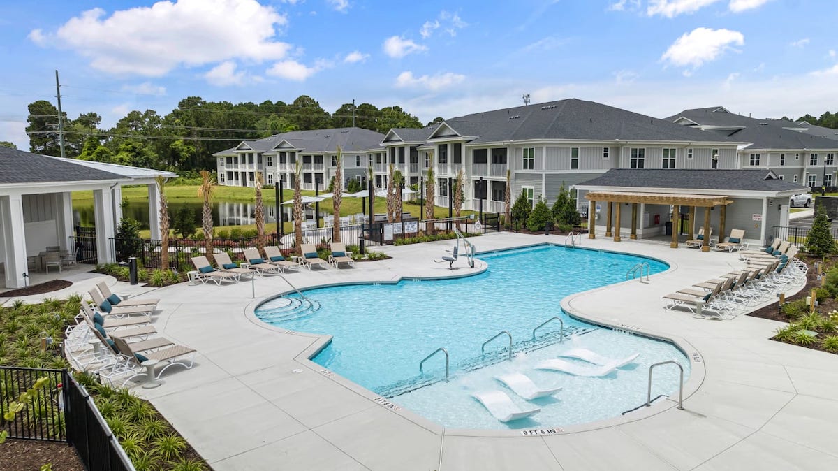 Hudson Carolina Forest exterior: pool + apartments